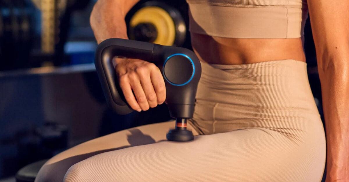 Compact massage gun for post-run soft-tissue work